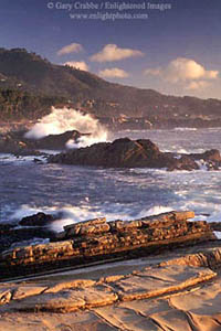 Crashing waves at sunset along rocky beach at Point Lobos State Reserve, near Carmel, Monterey County, California