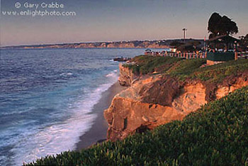 Waves rolling on to beach at sunset, Scripps Park, La Jolla, San Diego County, California