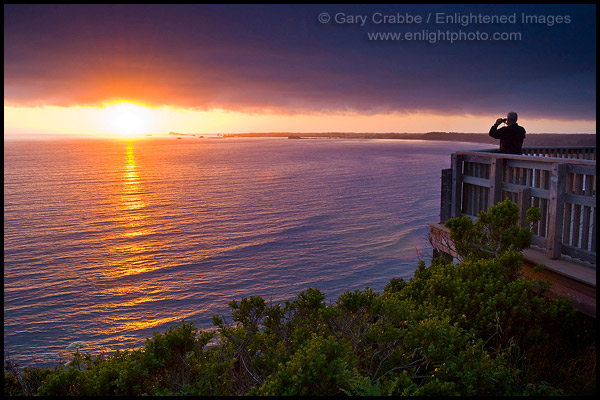 Photo: Person photographing the sunset from Enderts Beach Overlook, near Crescent City, Redwood National Park, California