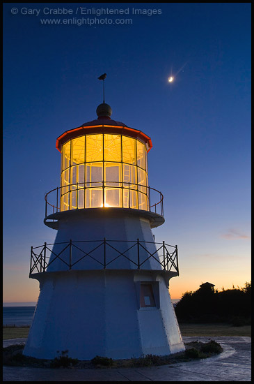 Photo: Crescent Moon over owl on the Cape Mendocino Lighthouse in evening light, Shelter Cove, Lost Coast, Humboldt County, California