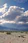 Clouds gathering over the high desert floor near Death Valley, California