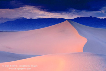 Pastel light on sand dunes after a storm, near Stovepipe Wells, Death Valley National Park, California