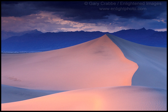 Picture: Pastel colors at sunset on sand dunes at Stovepipe Wells, Death Valley National Park, California