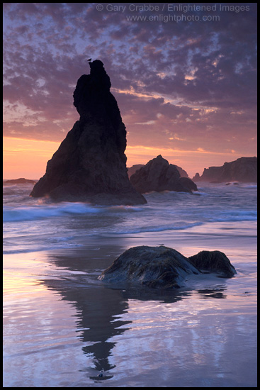 Picture: Sunset and clouds over sea stack at Bandon State Beach, Bandon, Oregon