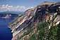 Forested steep slope of volcanic crater rim, Crater Lake National Park, Oregon