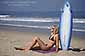 Woman sunbathing on the beach in Southern Caliifornia