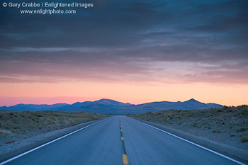 Photo: Storm clouds at sunrise over empty desert highway near Wells, Nevada