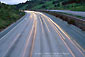 Photo: Commuter traffic headlights on multi-lane freeway, near Lafayette, California