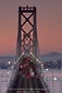 Photo: Commuter traffic on the San Francisco - Oakland Bay Bridge at dawn, San Francisco, California