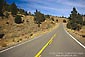 Photo: Two lane straight mountain road rising over Monitor Pass, Eastern Sierra, California