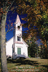 Colonial church and steeple in fall, White Mountains, New Hampshire