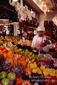 Fruitstand vendor at Pikes Place Market, Fishermans Wharf, Seattle, Washington