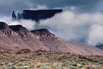 Storm clouds shroud The Priest and Nuns after a fall storm, Castle Valley, Utah