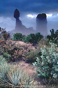 Stormy morning mist at Balanced Rock, Arches National Park, Utah