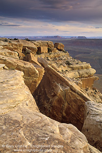 Picture: Fractured eroded rock atop high desert mesa at sunset, Muley Point Overlook, Glen Canyon NRA, Utah