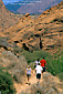 Image: Hikers on trail into canyon, Red Cliffs Recreation Area, near St. George, Utah's Dixie, Utah