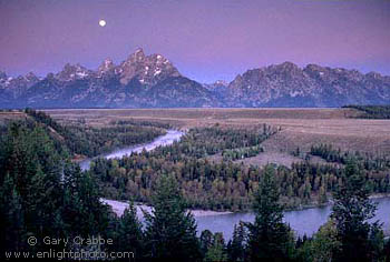 Moonset at dawn over the Teton Range and Snake River, Grand Teton National Park, Wyoming