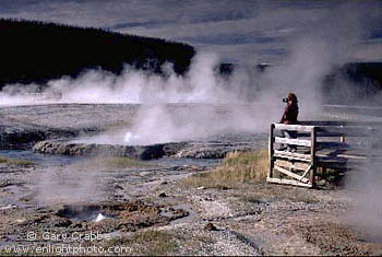 Tourist at Black Sand Geyser Basin, Yellowstone National Park, Wyoming